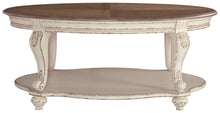 Realyn - White / Brown - Oval Cocktail Table