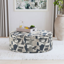 Tomkins - Oval Upholstered Storage Ottoman - Indigo Blue